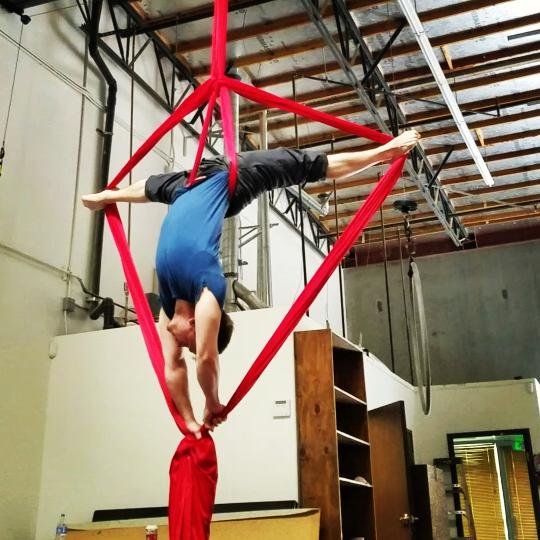 Glenn Davy doing aerials with silks