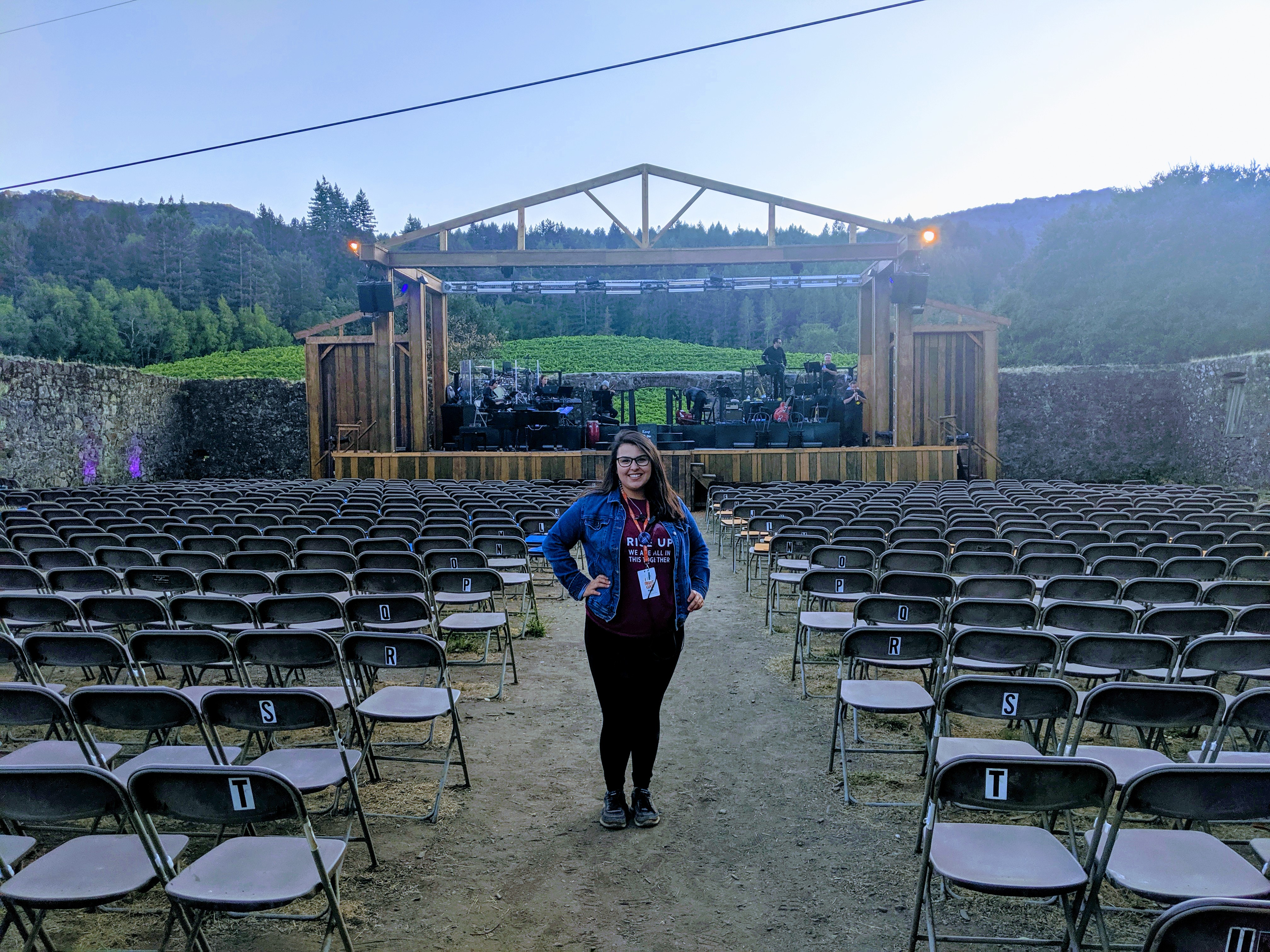 Maggie Simental standing outside in front of stage