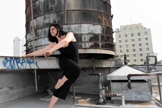 Jenna Valez dancing on a roof