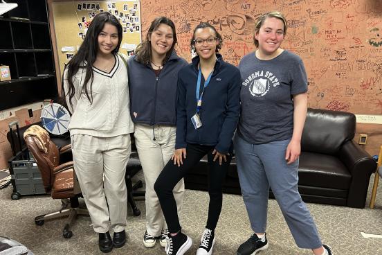 Students posting together in KSUN radio studio