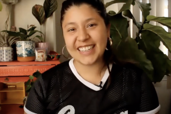 Screenshot of Noelle Dominique Rodriguez in her own home smiling