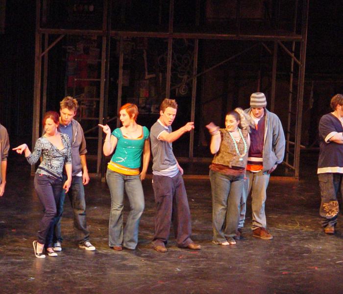 Actors performing on stage