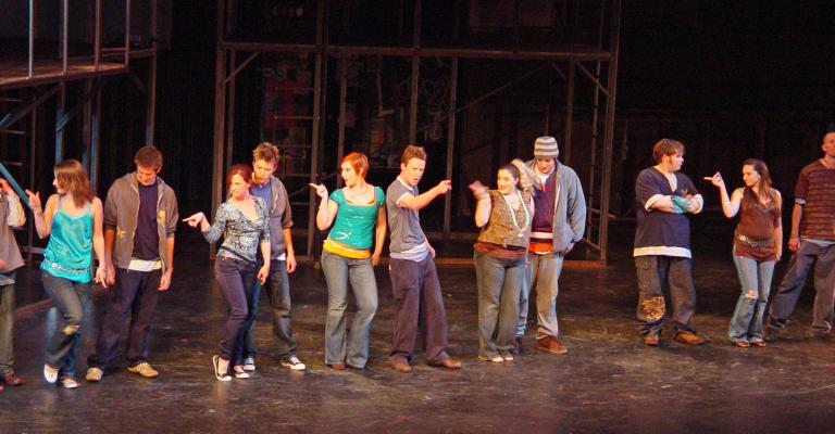 Actors performing on stage