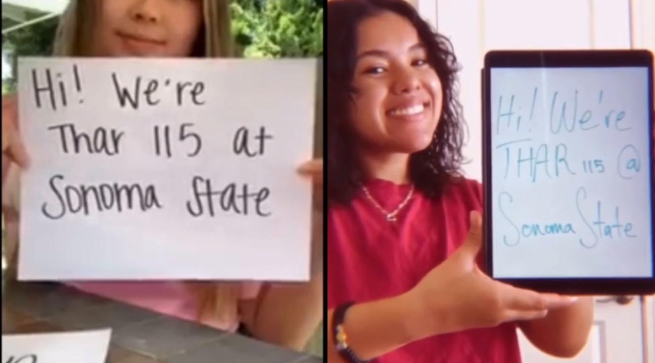 Dance students holding signs introducing their class "Hi! We're THAR 115 at Sonoma State"