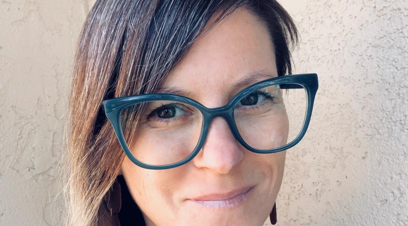 Christine Cali Headshot with glasses