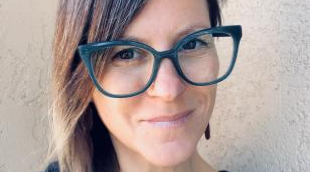 Christine Cali Headshot with glasses