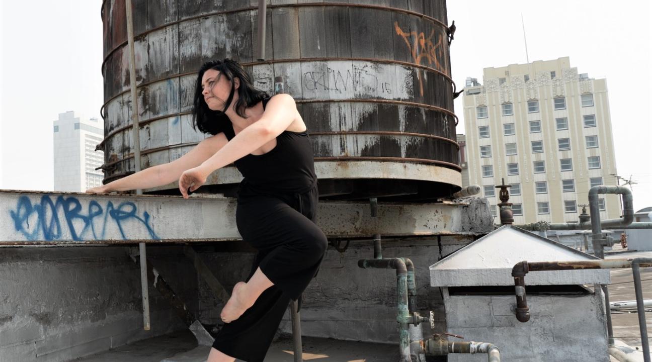 Jenna Valez dancing on a roof