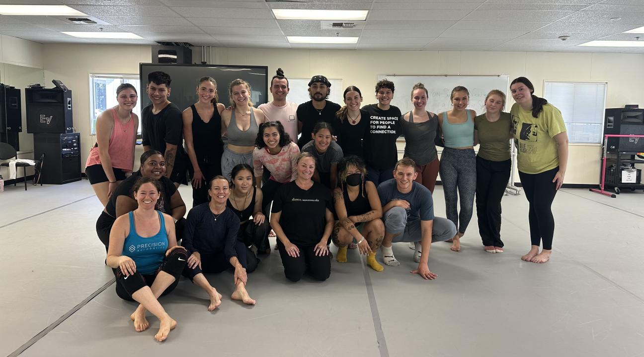 Students posing for a picture in dance studio