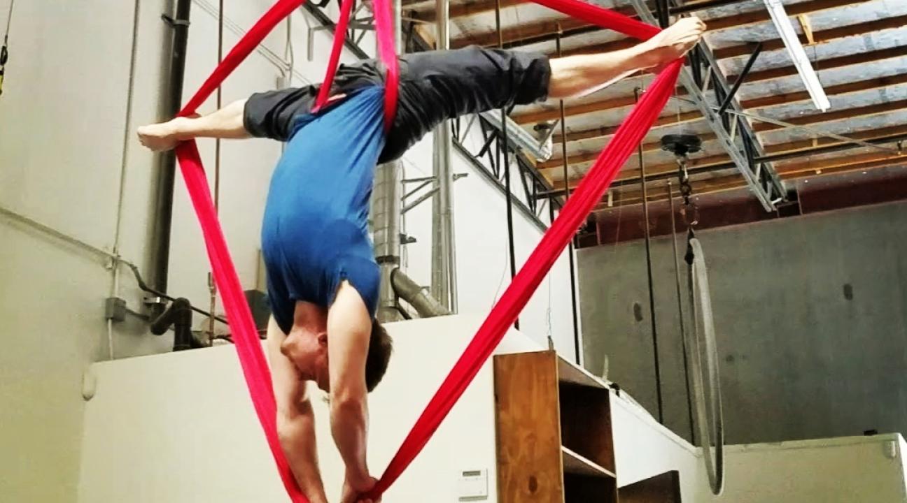 Glenn Davy doing aerials with silks