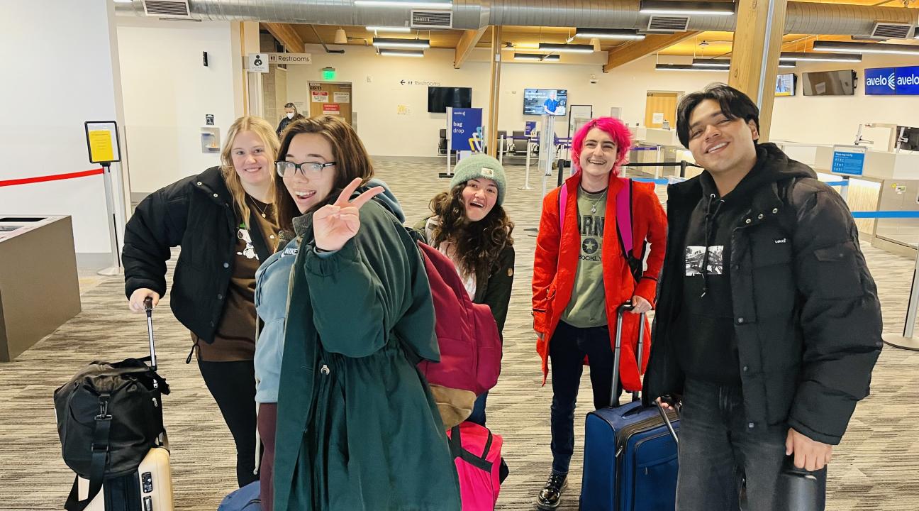 Students at airport ready to go