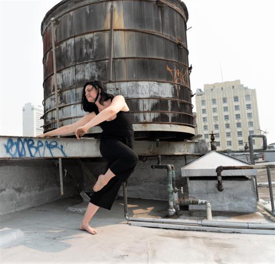 Jenna Valez dancing on a roof