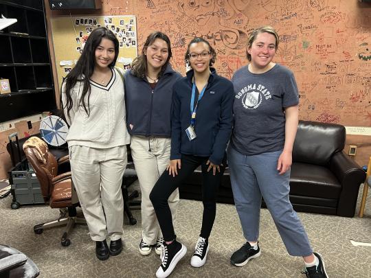 Students posting together in KSUN radio studio